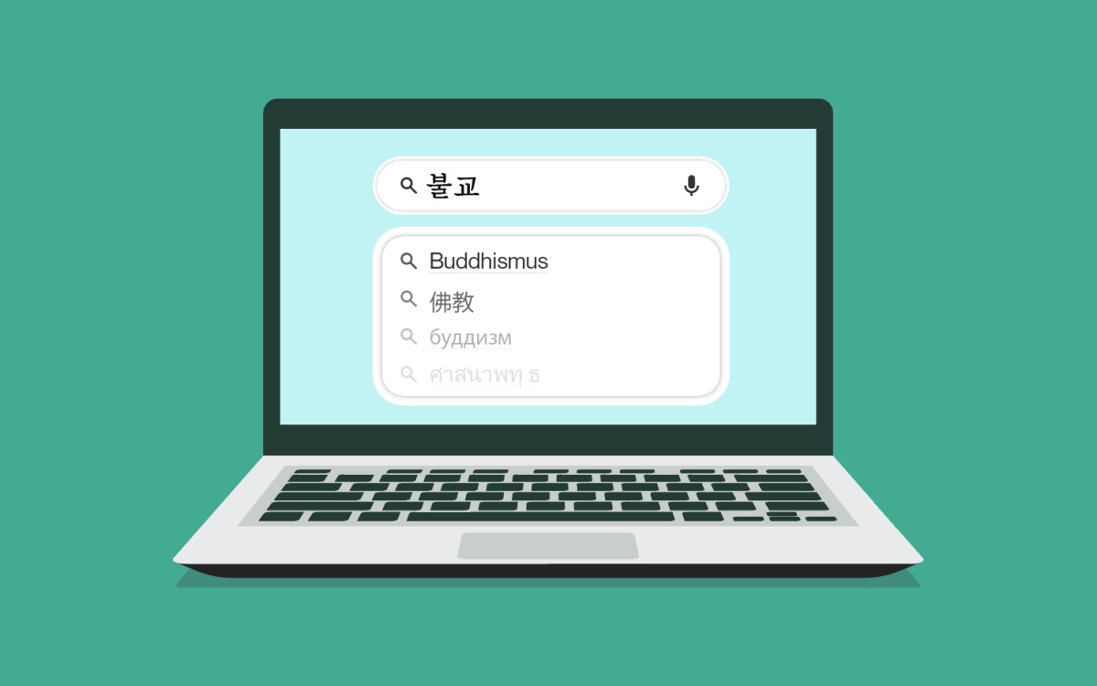 Computer using a search bar in multiple languages to search the term "Buddhism."